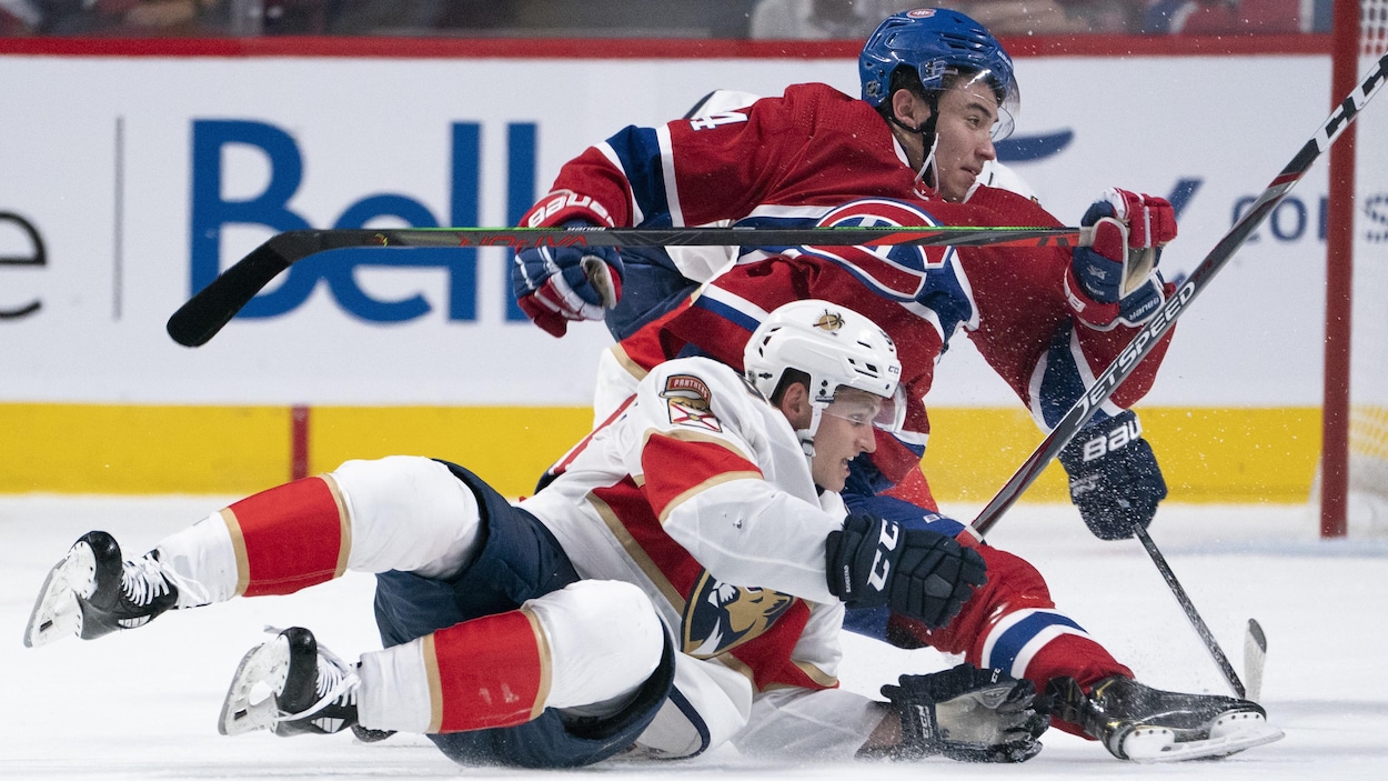 Suzuki, du Canadien, tombe sur le joueur des Panthers.