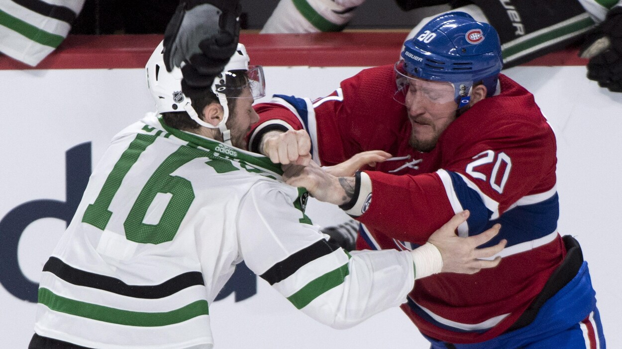 Nicolas Deslauriers se bat contre Jason Dickinson. Nicolas Deslauriers se bat contre Jason Dickinson.