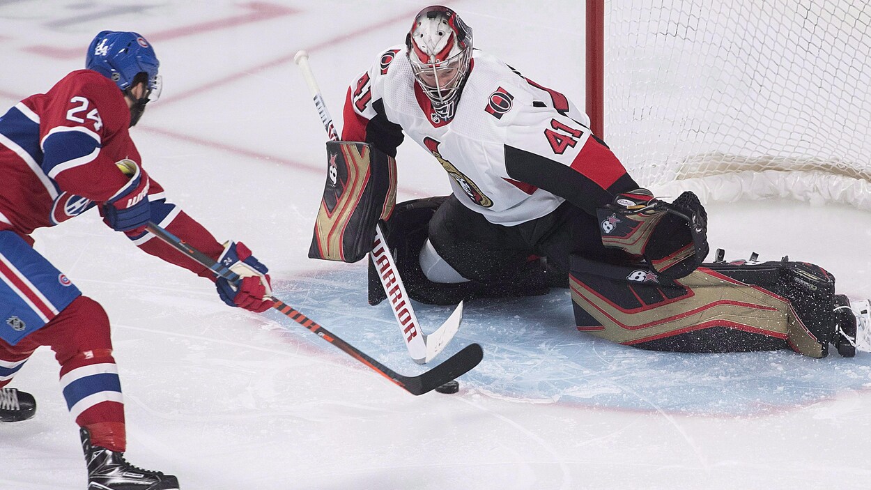 Phillip Danault (no 24) et Craig Anderson (no 41)