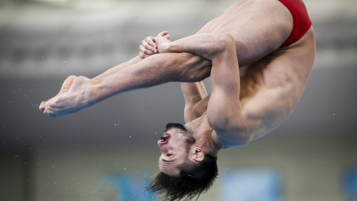 Francois Imbeau-Dulac réalise un plongeon en finale du 3 m au Grand Prix FINA de Calgary. Francois Imbeau-Dulac réalise un plongeon en finale du 3 m au Grand Prix FINA de Calgary.