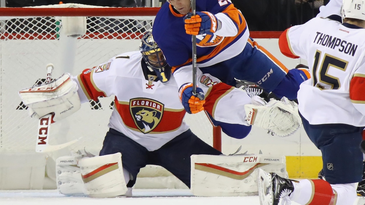 Roberto Luongo (à gauche) et Jason Chimera Roberto Luongo (à gauche) et Jason Chimera