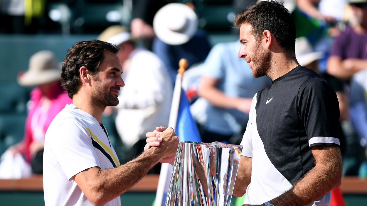 Roger Federer (gauche) et Juan Martin Del Potro (droite) Roger Federer (gauche) et Juan Martin Del Potro (droite)