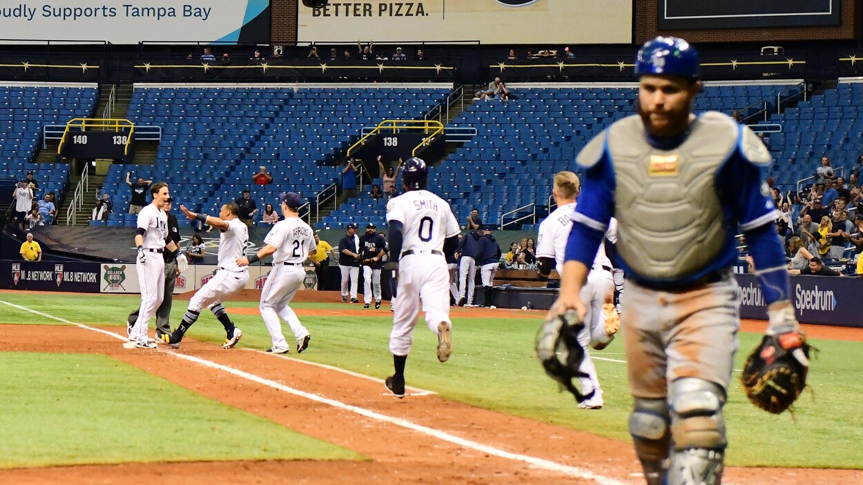 Russell Martin (à droite) après le simple gagnant de Matt Duffy Russell Martin (à droite) après le simple gagnant de Matt Duffy