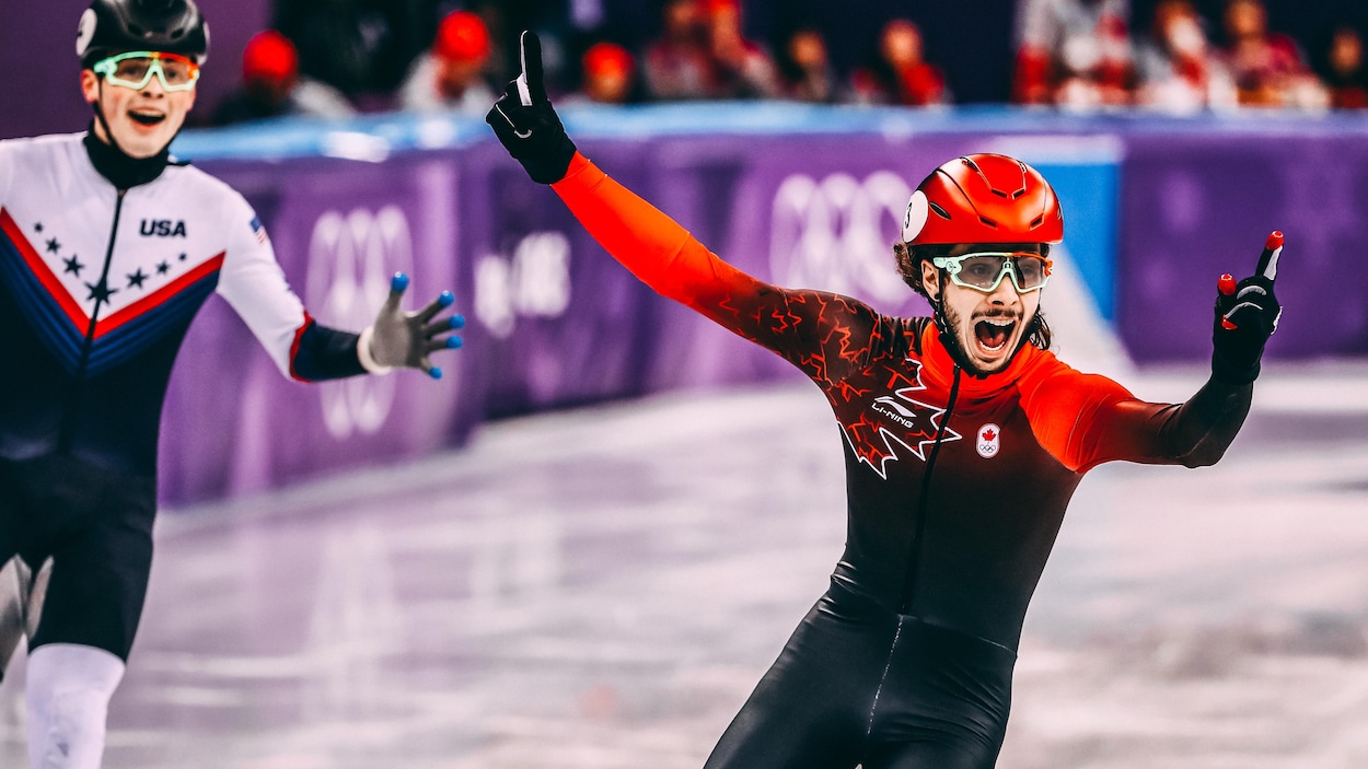 Samuel Girard réalise qu'il vient de remporter la médaille d'or au 1000 m des Jeux olympiques de Pyeongchang, devant l'Américain John-Henry Krueger. Samuel Girard réalise qu'il vient de remporter la médaille d'or au 1000 m des Jeux olympiques de Pyeongchang, devant l'Américain John-Henry Krueger.
