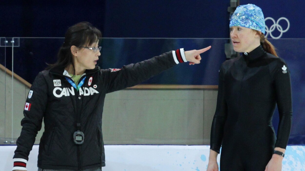 Wang Xiuli , en compagnie de Clara Hughes Wang Xiuli , en compagnie de Clara Hughes