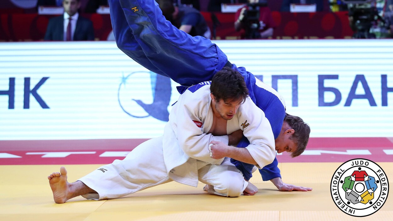 Étienne Briand en action avec son adversaire