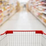 A stock image of a shopping cart in supermarket aisle. The supposed 'grocery cart theory' proposes that returning your cart is a litmus test of your character. A new video by a mom who says she never returns her cart has enraged the internet. 