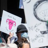 People in Montreal take part in a protest on Sunday to denounce the U.S. Supreme Court's decision to overturn the law that provided the constitutional right to abortion for almost 50 years. (Graham Hughes/The Canadian Press)