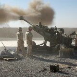 A M-777 artillery unit fires at a target during the Afghan war on Nov. 24, 2010. These guns fire 155 millimetre shells — the type Canada is struggling to produce. 