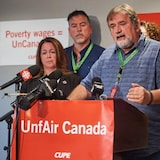 Air Canada staff representatives holding a press conference.