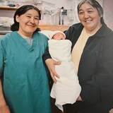 Retired midwives Akinisie Qumaluk, right, and Leah Qinuajuak in a photo from their early years working in the maternity clinic at the Inuulitsivik Health Centre. (Duncan McCue/CBC)
