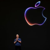 Apple CEO Tim Cook is shown at the company's Worldwide Developers Conference in Cupertino, Calif., on Monday. Apple unveiled a long-awaited AI strategy, integrating Apple Intelligence across its suite of apps, and announced a partnership with OpenAI to bring ChatGPT to its devices. 