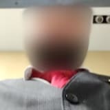 This Air Canada employee was photographed by a security app after trying to unlock a phone that had been left behind at Toronto's Pearson International Airport. CBC News obscured his face to protect his identity. 