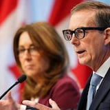 Bank of Canada governor Tiff Macklem, right, and Carolyn Rogers, senior deputy governor, speak to reporters in Ottawa on Wednesday. The bank announced it was leaving its key overnight lending rate unchanged at five per cent, citing inflation and concerns it would be forced to backtrack. 