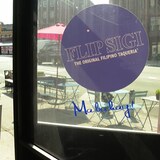 Ang pinto ng FlipSigi restaurant sa New York.