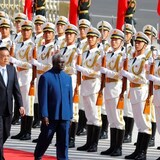 Solomon Islands Prime Minister Manasseh Sogavare is welcomed in China by then-premier Li Keqiang in 2019. Sogavare has since signed a security pact with China and delayed elections. (Thomas Peter/Reuters)