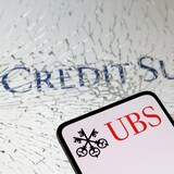 Credit Suisse and UBS bank logos.