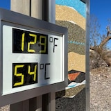 A view of a digital sign displaying the high temperature in Death Valley, Calif., on July 15, 2023. Global temperatures hit a record that month, and the year ended up being the hottest on record. 