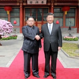 金正恩和习近平。