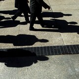 Shadows of people walking.