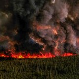 The Donnie Creek fire in northeastern B.C. is seen during a planned ignition operation on June 3. (B.C. Wildfire Service)
