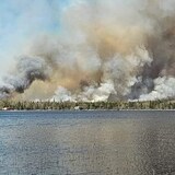 Officials say the weather forecast for Tuesday is not favourable for battling an out-of-control wildfire in the area, as winds are expected to pick up. 