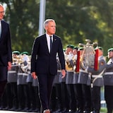 German Chancellor Friedrich Merz receives Canadian Prime Minister Mark Carney at the chancellery in Berlin on Tuesday. 