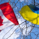 The Canadian flag flies next to that of Ukraine.
