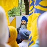Protesters chant outside of the Consulate General of India office in response to the shooting death of Hardeep Singh Nijjar in Vancouver on Saturday, June 24, 2023. (Ethan Cairns/The Canadian Press)