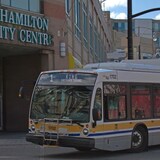A HSR bus drives through downtown Hamilton. A team of researchers from McMaster are looking into ways to improve the transit experience for older, immigrant adults. (Bobby Hristova/CBC)