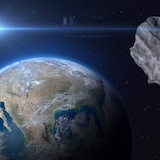 An illustration depicts an asteroid near Earth. Asteroid 2024 MK will pass roughly 290,000 km from our planet on Saturday. 