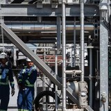 Workers at Air Products hydrogen production plant in Edmonton on Aug. 25, 2022. This past winter, the federal government and Alberta announced a $461-million investment into the plant. (Amber Bracken/The Canadian Press)