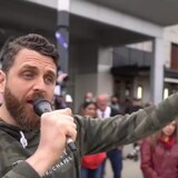Jacob Reaume, pastor at Trinity Bible Chapel in Waterloo, Ont., speaks at a 2021 event in Waterloo Town Square.