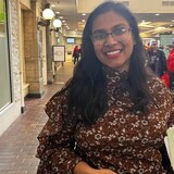 Lakshi Chandrathilak is looking for social work opportunities after she graduates from her college program in the summer. She says career fairs allow job seekers to have better in person interactions with employers. (Isha Bhargava/CBC )
