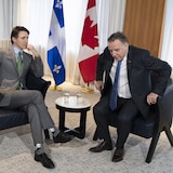 魁北克省长勒戈（François Legault）与特鲁多。