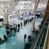 Long lines of travellers are seen at Vancouver International Airport, on Sunday.
