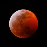 This photo shows the moon during the June 2019 total lunar eclipse. The eclipse taking place overnight between Thursday and Friday will be a near-total eclipse, meaning the Earth's shadow will be cast across most but not all of the moon's surface.