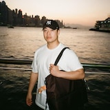 Marvin Chan poses on the waterfront in Hong Kong.