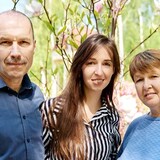 Oksana Grygorieva, centre, poses with her parents, Leonid Kubatin, left, and Iryna Kubatina, in Kharkiv in 2019. Grygorieva, who lives in Toronto, helped her parents apply to the Canadian government's temporary residence program for Ukrainians fleeing the war. Three months later, they're still waiting to hear back. (Submitted by Oksana Grygorieva)