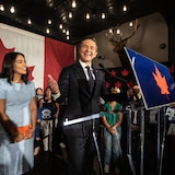 Anaida and Pierre Poilievre, all smiles, on stage.