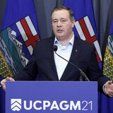 Alberta Premier Jason Kenney speaks after the United Conservative Party annual meeting in Calgary on Nov. 21. On Monday, Kenney said he has asked Justice Minister Kaycee Madu to step back from his ministerial duties.