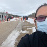 Chemawawin Cree Nation has had a community checkpoint for over two years to limit COVID-transmission and plans to keep it operating for the time being. Pictured here is Quentin Mink, security supervisor at the checkpoint, in 2021. (Submitted Quentin Mink)