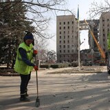 Cleanup crews sift through the rubble after a Russian airstrike hit the regional administration building in Mykolaiv on Tuesday, killing 20 people. 