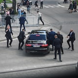 Security officers move Slovak Prime Minister Robert Fico in a car after a shooting following a government meeting in Handlova on Wednesday. 
