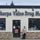 Satya Patel stands in front of her pharmacy in Mayerthorpe, Alta. She moved to Canada 12 years earlier.