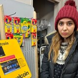 Parisa Ghanbari said a phone scammer pretending to be a federal government agent convinced her to deposit nearly $11,000 in a downtown Edmonton bitcoin ATM. (Scott Neufeld/CBC)