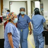 Nurses move through the halls of the emergency department at Scarborough General Hospital in Toronto. 