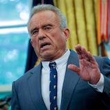 a man gestures in a headshot