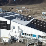 Solar panels shown on a building. 