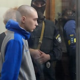 Russian Army Sergeant Vadim Shishimarin, 21, is seen behind glass during a court hearing in kyiv, Ukraine, Friday, May 13, 2022.